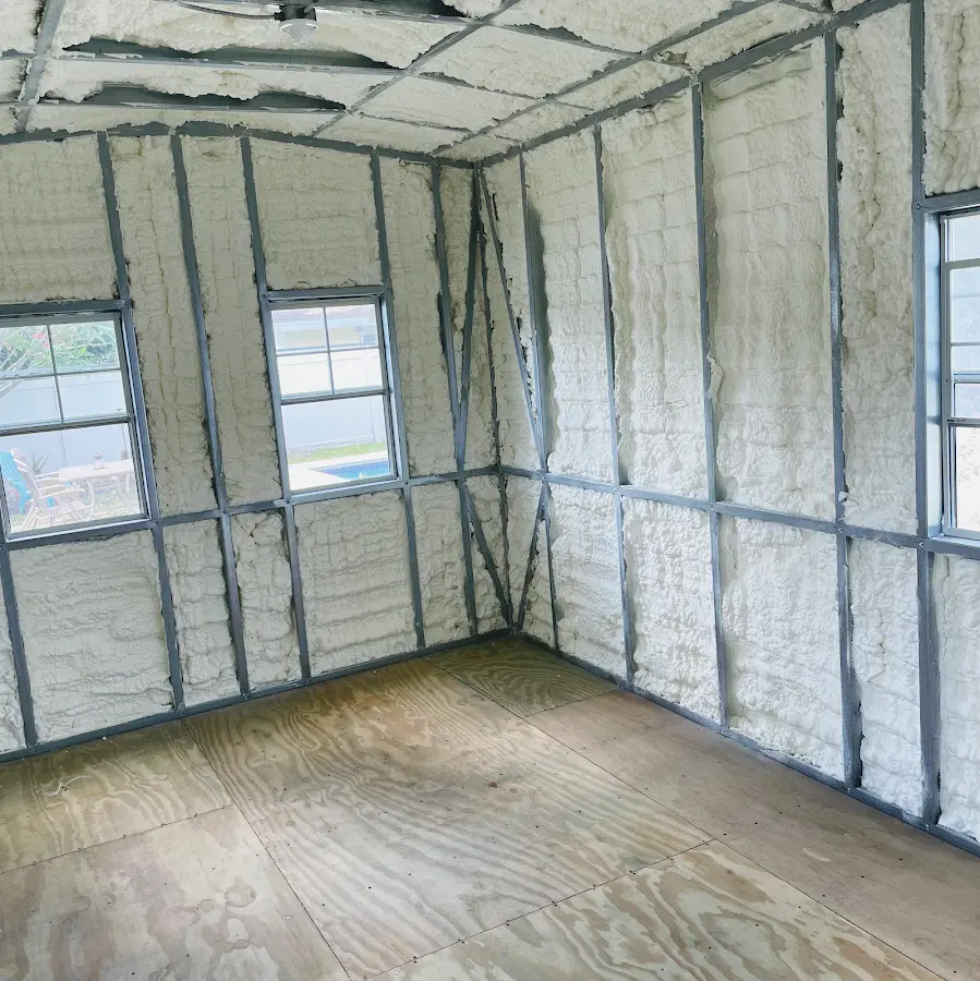 Closed-cell spray foam insulation applied to wall cavities in a residential project in St. Johnsbury